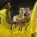 Michigan freshman Glenn Robinson III, freshman Nik Stauskas and freshman Spike Albrecht celebrate a three-point basket by Albrecht in the first half at the Georgia Dome in the national championship game in Atlanta on Monday, April 8, 2013. Melanie Maxwell I AnnArbor.com